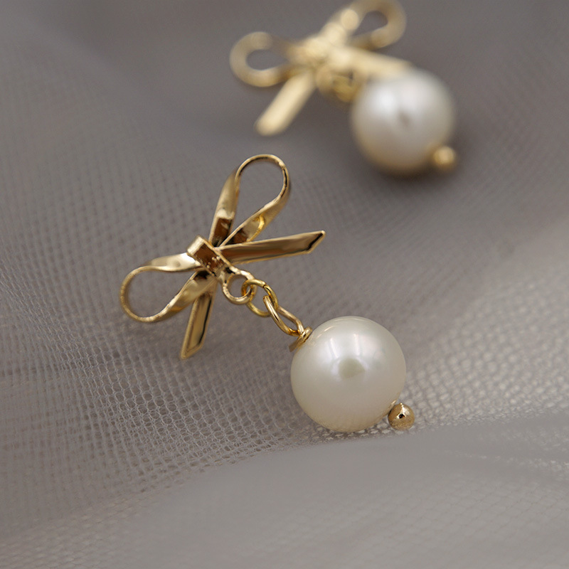 S925 silver needle stud earrings, elegant pearl Korean bow earrings, cute pendant accessories, fashionable and versatile earrings Item Picture