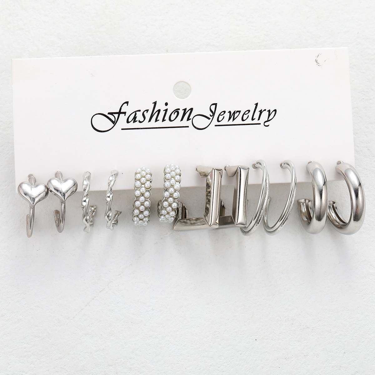 A new cross-border InS-style C-shaped creative and simple heart-shaped imitation pearl geometric earrings 6-piece set, retro pearl earrings full figure