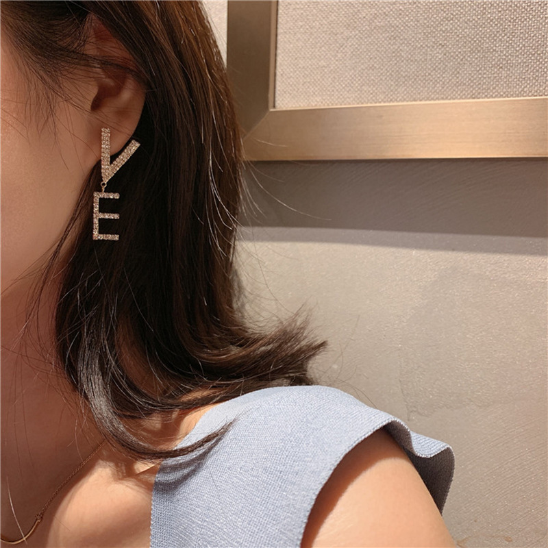 The new Korean S925 silver needle full diamond "LOVE" letter earrings are a popular, stylish and versatile accessory for women details Picture