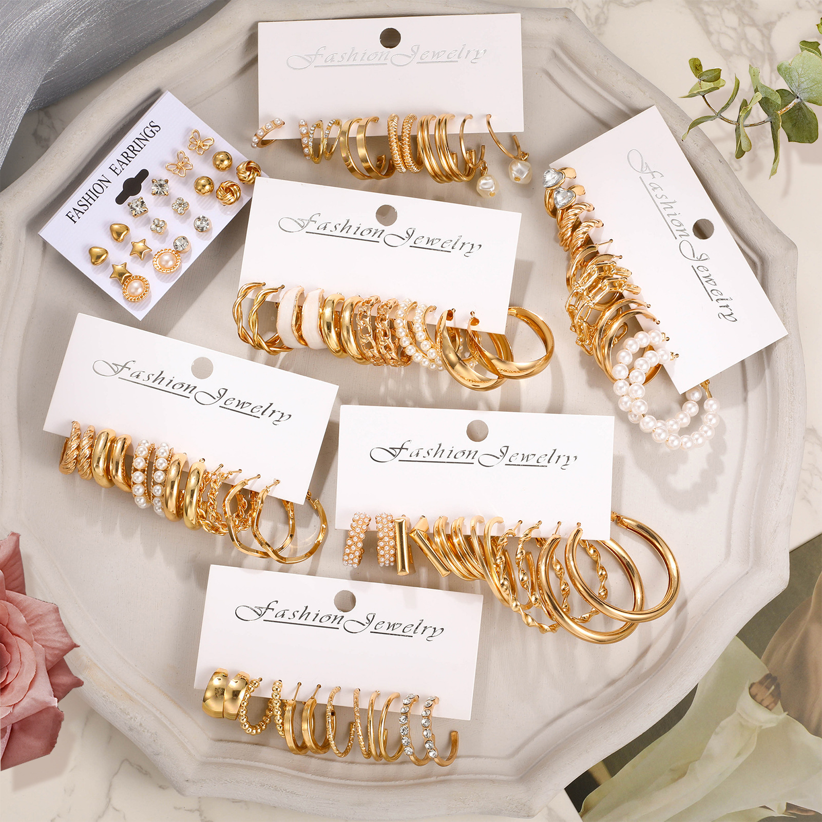 New cross-border European and American personalized heart-shaped imitation pearl hollowed-out C-shaped fashionable ins simple women's earrings 45-piece set Application Scenario