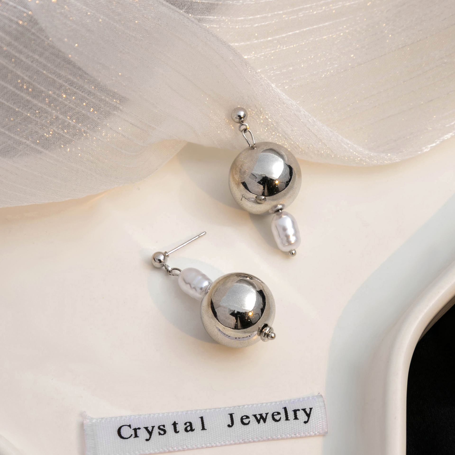 Silver needle, European and American irregular geometric round teardrop pearl earrings, retro personality, metal design sense, stud earrings for women details Picture