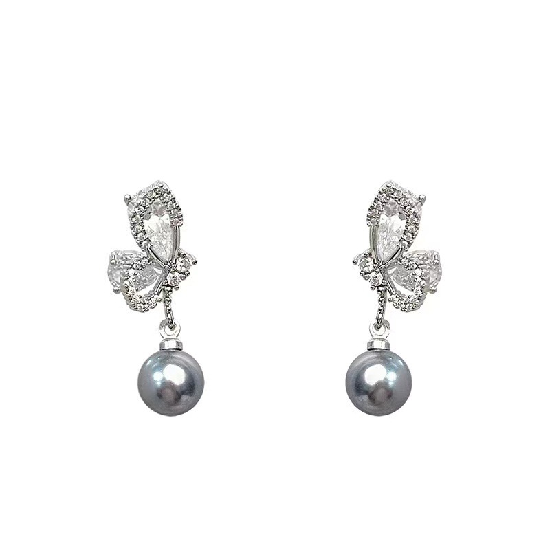 The 2025 new grey butterfly pearl earrings are gentle and versatile for women. The tassel stud earrings are a niche and high-end design accessory Item Picture