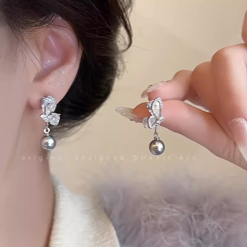 Unique butterfly pearl silver needle earrings for women with a high-end feel, micro-inlay round and square face stud earrings, new design sense earrings for 2024 details Picture