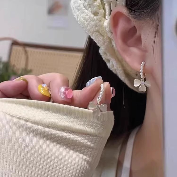 Niche design sense, high-end bow pearl ring earrings, women's summer 2025 new trendy earring earrings full figure