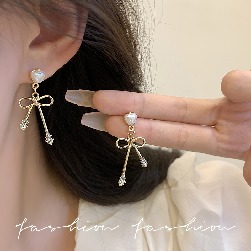 s925 silver needle elegant pearl earrings, sweet bow for women, internet-famous stud earrings, light luxury style, versatile ear pendant accessories details Picture