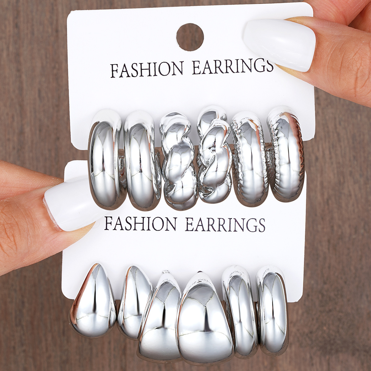 Wholesale of 6-piece cross-border geometric cold style CCB twist water drop earrings, a fashionable and creative card set of earrings full figure