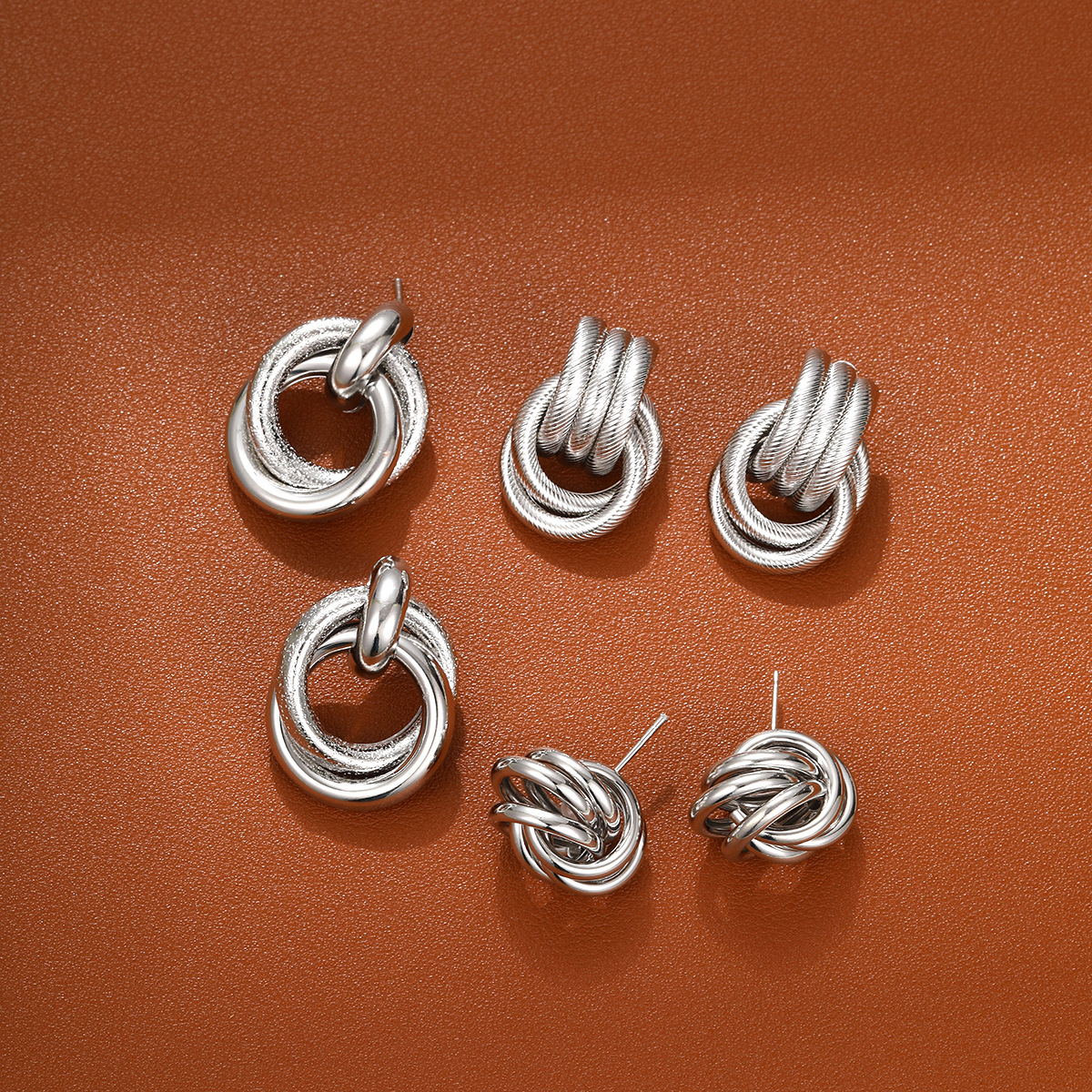 A set of 3 pairs of cross-border metal earrings from Europe and America, featuring exaggerated geometric twist earrings and a minimalist style on Instagram Application Scenario