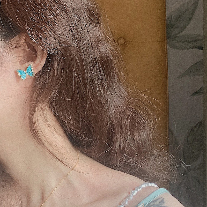 S925 Silver Needle Retro Hong Kong Style vintage oil Drip blue rhinestone butterfly simple and elegant stud earrings Application Scenario