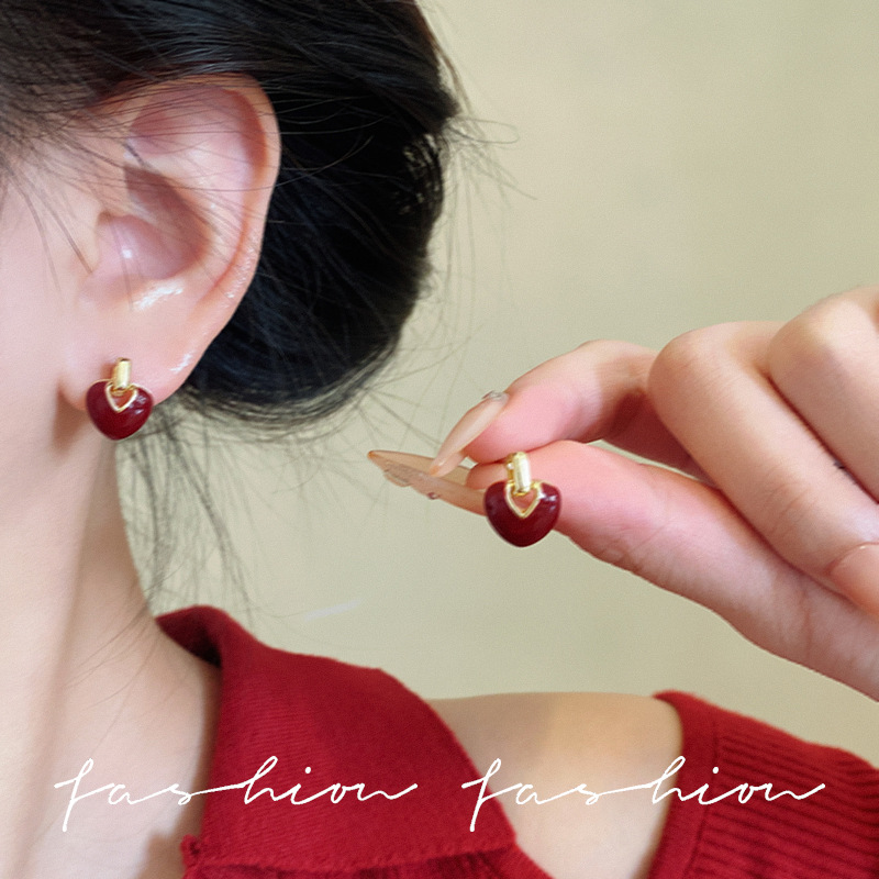 Heart-shaped stud earrings for women, a niche design with a sense of sophistication, a series of red oil-dripping New Year girl retro Christmas earrings details Picture