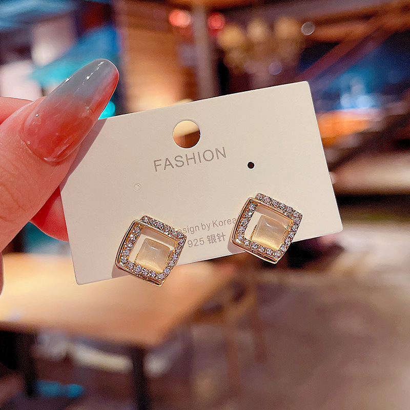 S925 Silver Needle Korean version New diamond-encrusted geometric cat's eye stone earrings, women's design sense, elegant and simple stud earrings details Picture