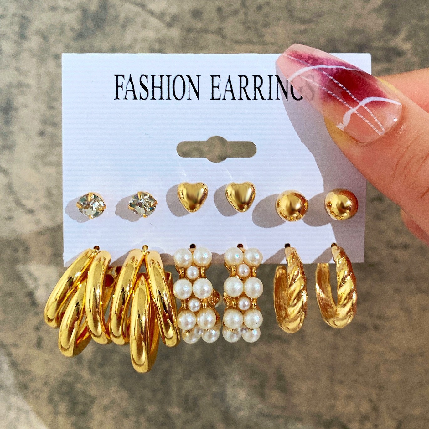 European and American fashionable metal circle imitation pearl stud set, creative and elegant cross-border heart-shaped butterfly earrings for women Application Scenario