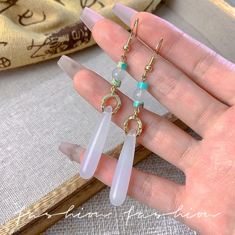 New Chinese-style fringed long ancient-style earrings, niche design sense ear hooks and earrings, high-end horse face skirt accessories full figure