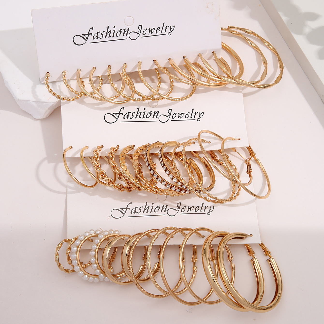 Youdaoplaceholder0 set European and American metal earrings, cross-border new ins earrings, gold C-shaped dot rhindiamond earrings for women Specification drawing