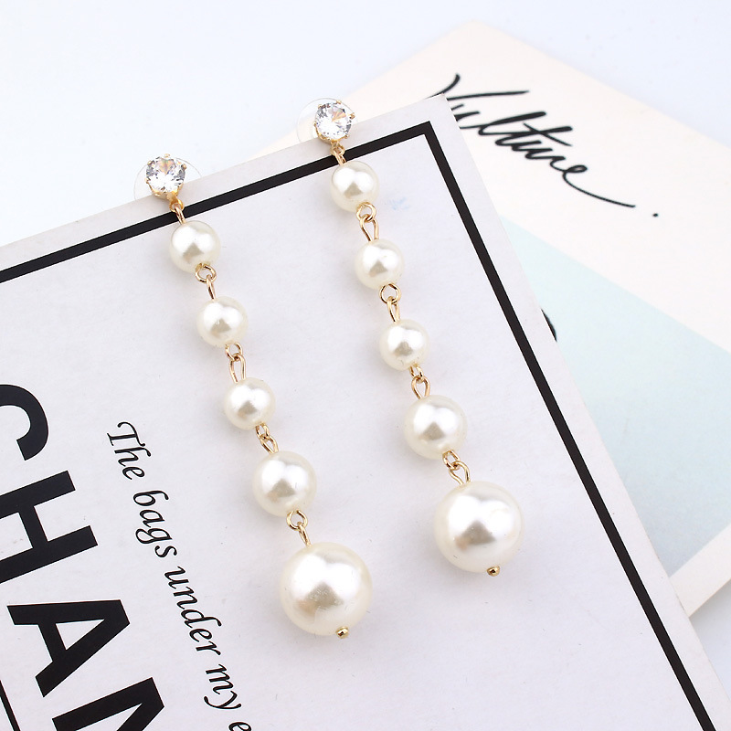 S925 Silver needle fashionable and elegant European and American light luxury long pearl zircon earrings, women's trendy tassel stud earrings full figure