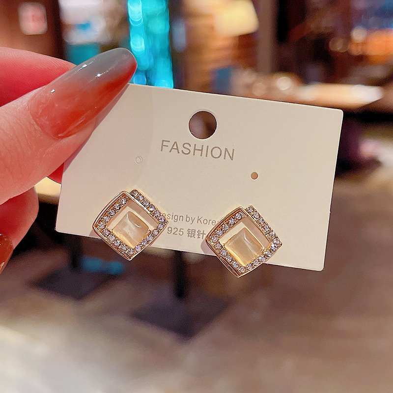 S925 Silver Needle Korean version New diamond-encrusted geometric cat's eye stone earrings, women's design sense, elegant and simple stud earrings full figure