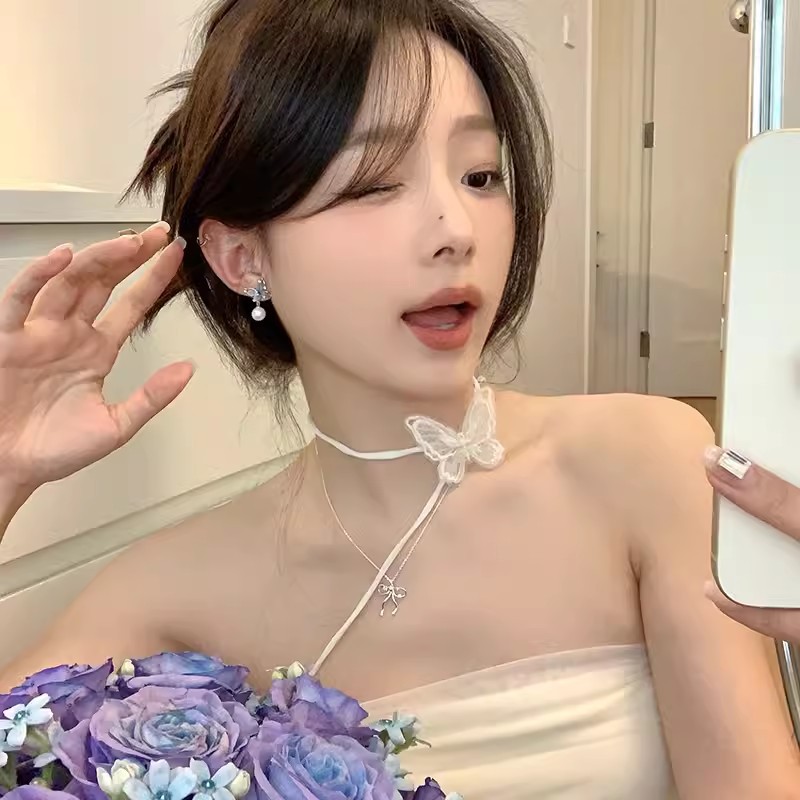 Blue butterfly pearl tassel earrings for women, exuding a touch of light luxury and sophistication, with a gentle and refined temperament. New 2024 exquisite earrings Application Scenario
