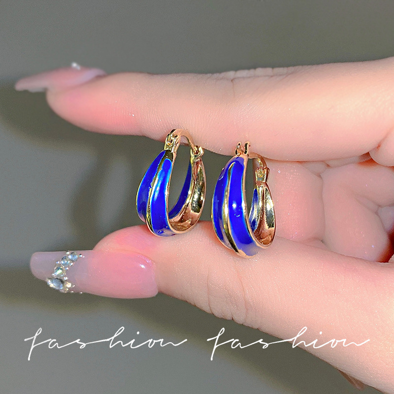 The new silver needle Korean-style simple European and American style earrings from Krhein Blue ear rings, with a cold and niche design sense and a high-end feel full figure