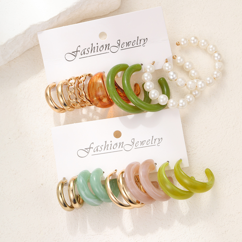 A new cross-border bestseller set of 10-piece imitation pearl resin earrings, a creative and stylish C-shaped earring set with a European and American style Application Scenario
