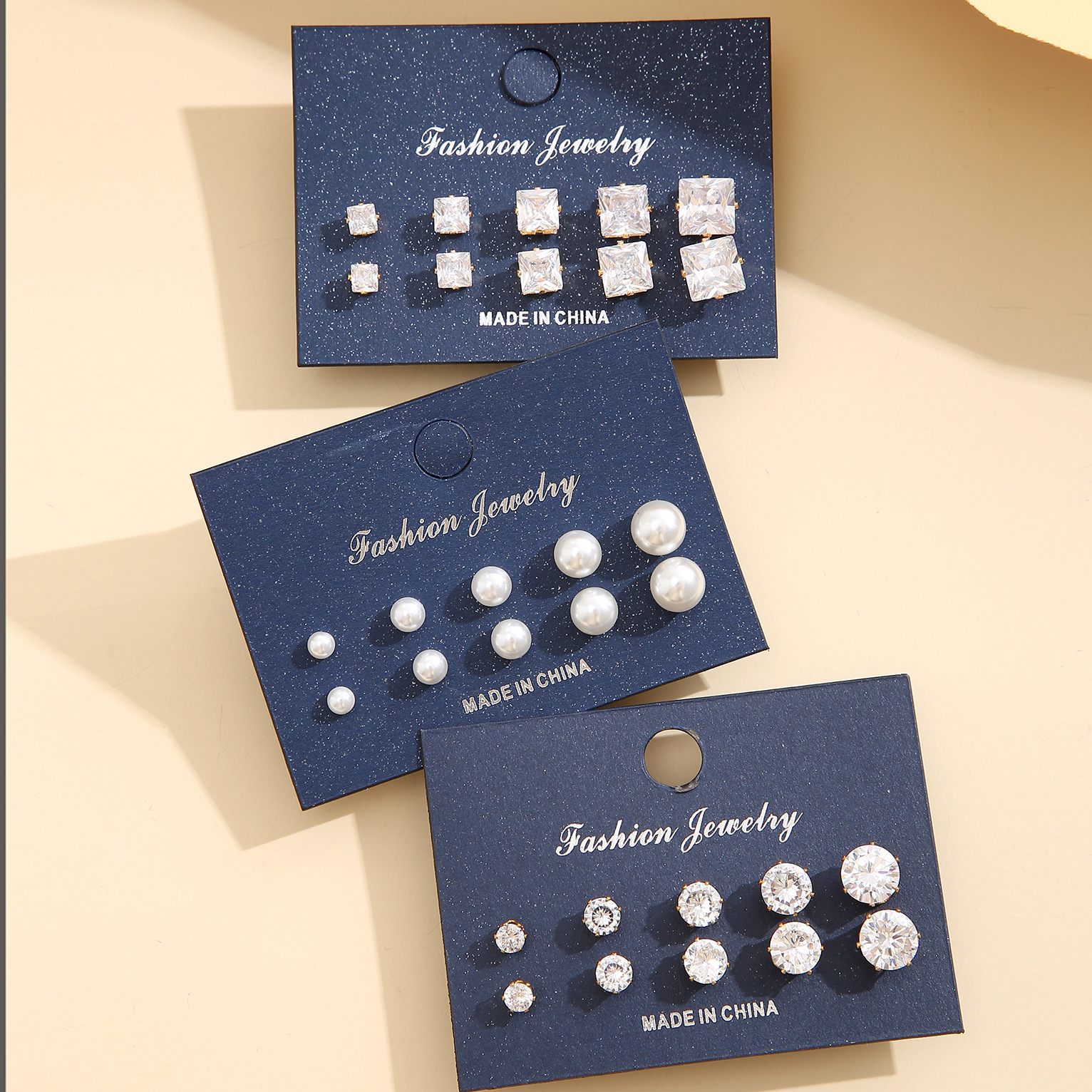 A set of 15 pairs of geometric six-pronged zircon stud earrings with a retro style and a pearl-like appearance, which are popular in European and American foreign trade Specification drawing