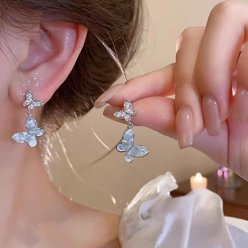Blue crystal butterfly earrings, small, exquisite and high-end fashionable stud earrings, 925 silver needle and elegant tassel earrings full figure