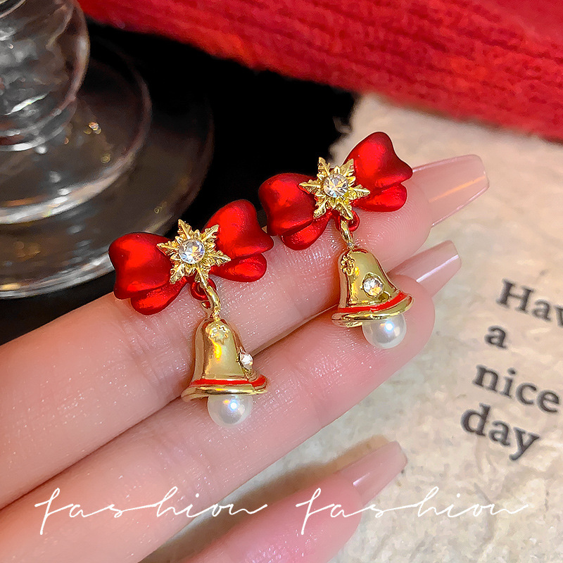 Christmas silver needle diamond-encrusted snowflake bell pearl stud earrings with a light luxury design, red bow New Year earrings full figure