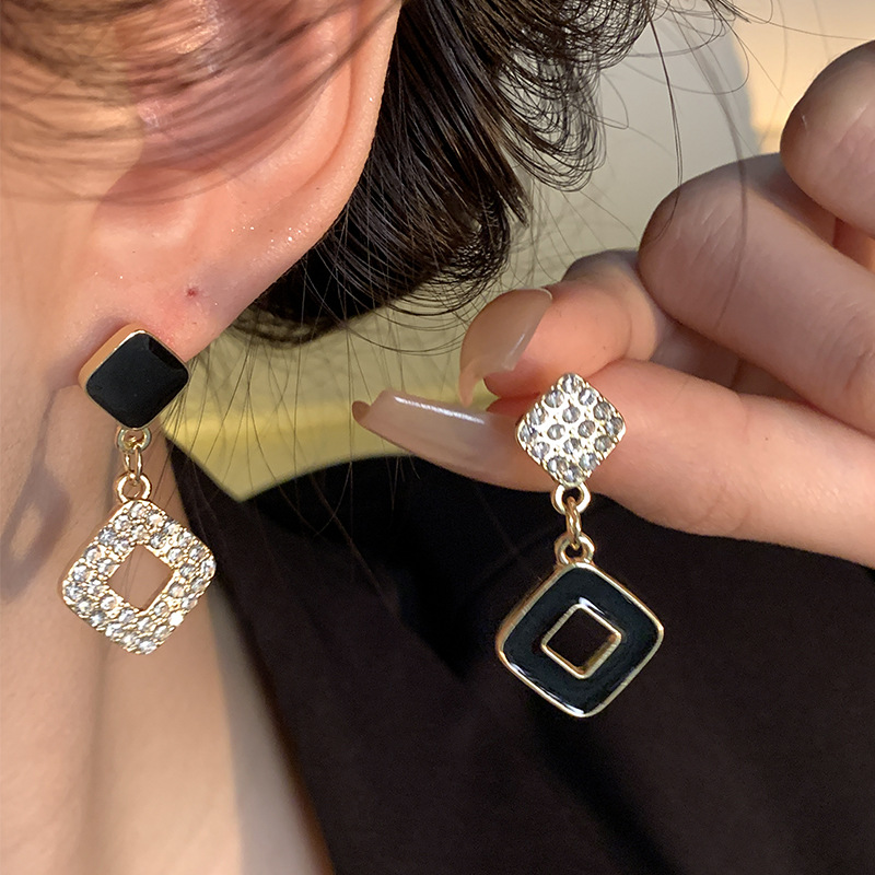 Black small square earrings, a new 2024 bestseller with a micro-inlay and niche design, featuring silver needle earrings for women, are a light luxury and versatile accessory Application Scenario