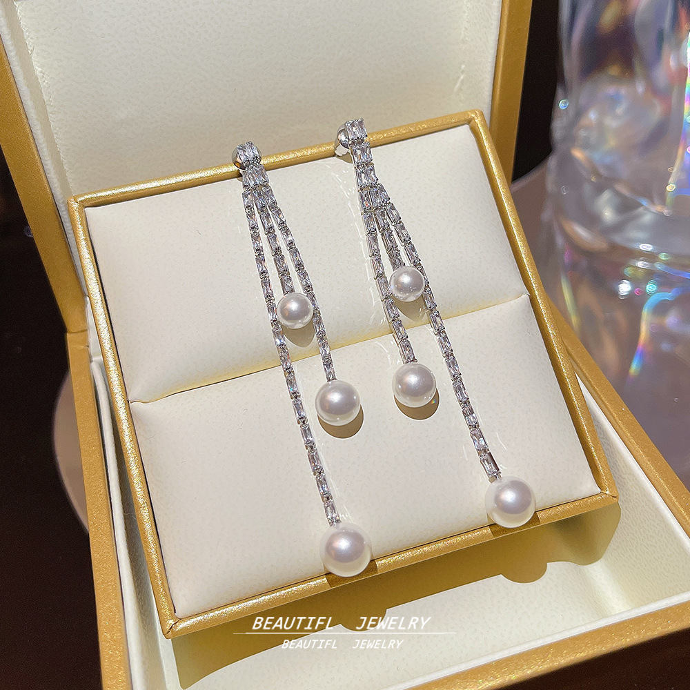 A unique pair of S925 silver pin tassel earrings with a unique design sense, a niche and popular pearl earring for women details Picture