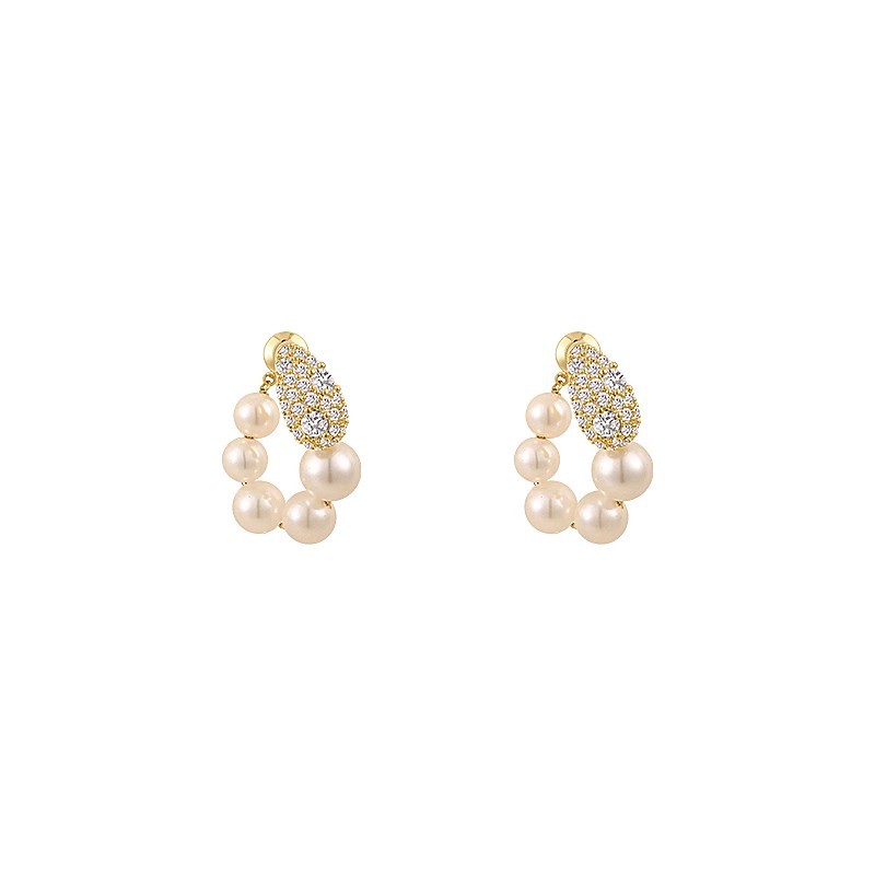 Zircon pearl earrings and ear rings are a niche design for women, exuding a sense of high-end luxury and uniqueness. They are unique stud earrings for cross-border commuting in Europe and America Item Picture