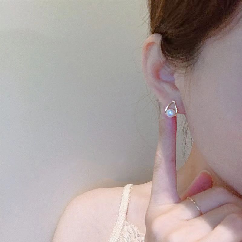 925 Silver needle simple teardrop pearl Stud earrings for women, Korean style fashionable, individual and creative earrings, ins style artistic earrings details Picture