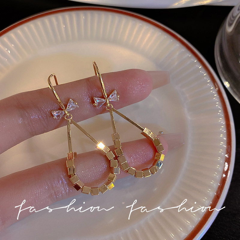 Micro-inlaid zircon bow ear hooks, European and American style, unique square style earrings, 925 silver needle, high-end earrings full figure