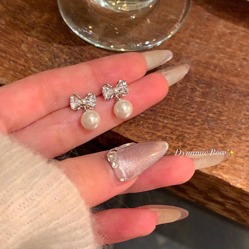Bow pearl stud earrings for women, light luxury and high-end exquisite earrings, 2025 new bestseller earrings, Yiwu accessories full figure