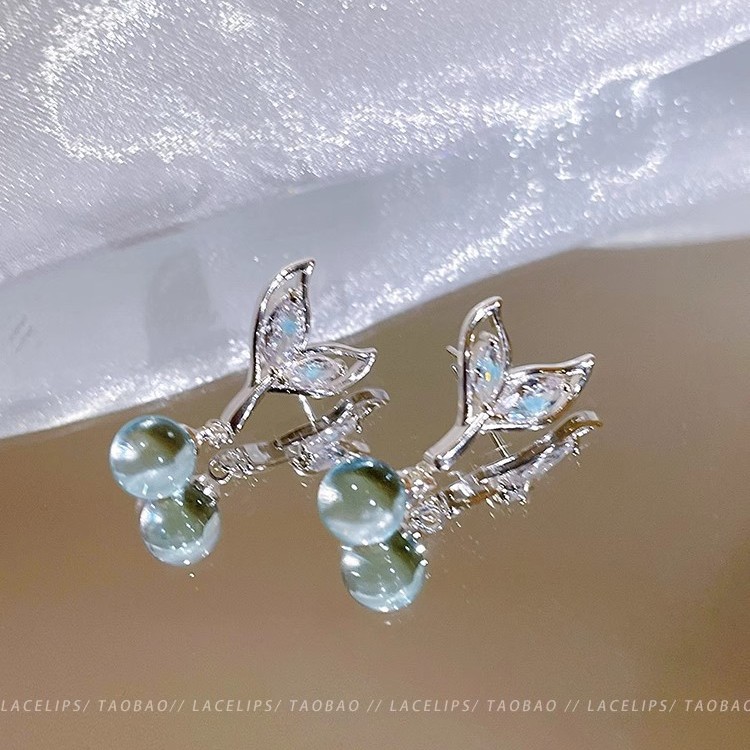 Summer fishtail beaded pendant earrings exude a sense of feminine sophistication and a touch of light luxury. Versatile stud earrings and long tassel earrings details Picture