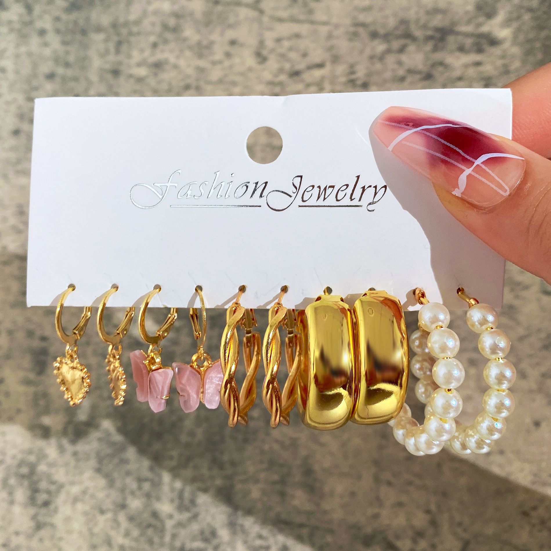 Wholesale of new cross-border imitation pearl earring heart-shaped pendant earrings and creative pink acrylic butterfly pendant earrings full figure