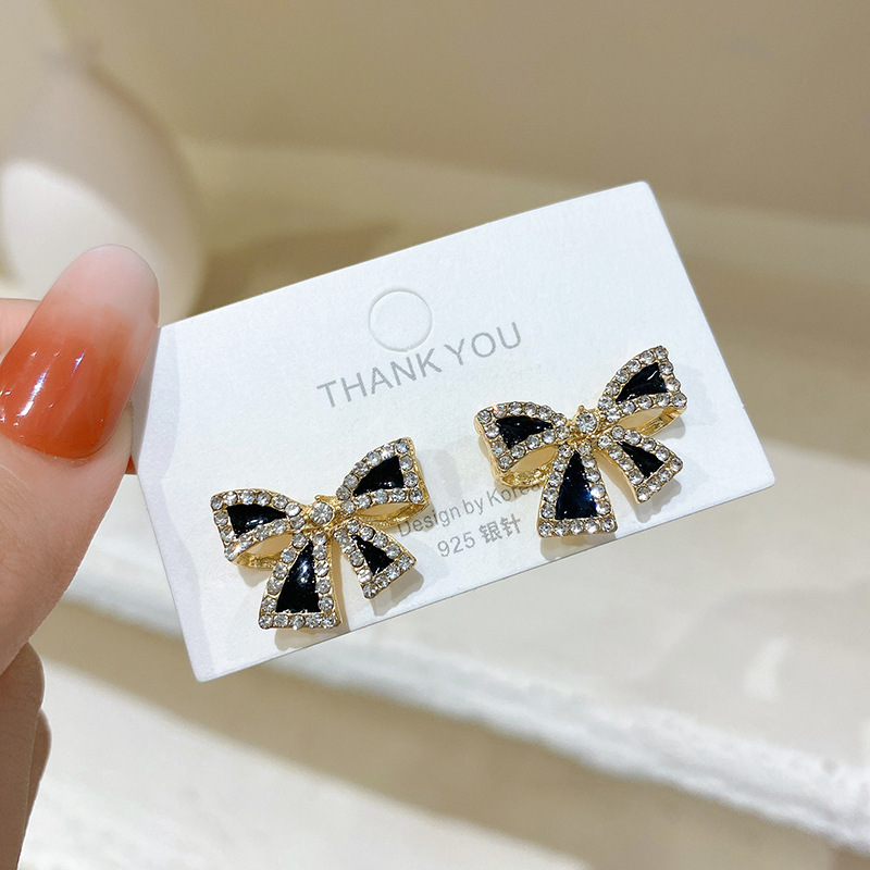S925 Silver Needle new black bow with sparkling diamond stud earrings for women, Korean simple and elegant style, cold and sweet earrings trend full figure