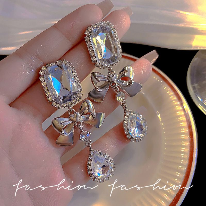 925 Silver needle diamond geometric bow teardrop earrings, European and American exaggerated design sense earrings, elegant and light luxury earrings full figure