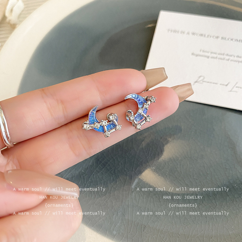 Super ethereal and clear blue moon stud earrings for women's Instagram niche, dreamy and versatile design earrings. New zircon earrings are trendy details Picture