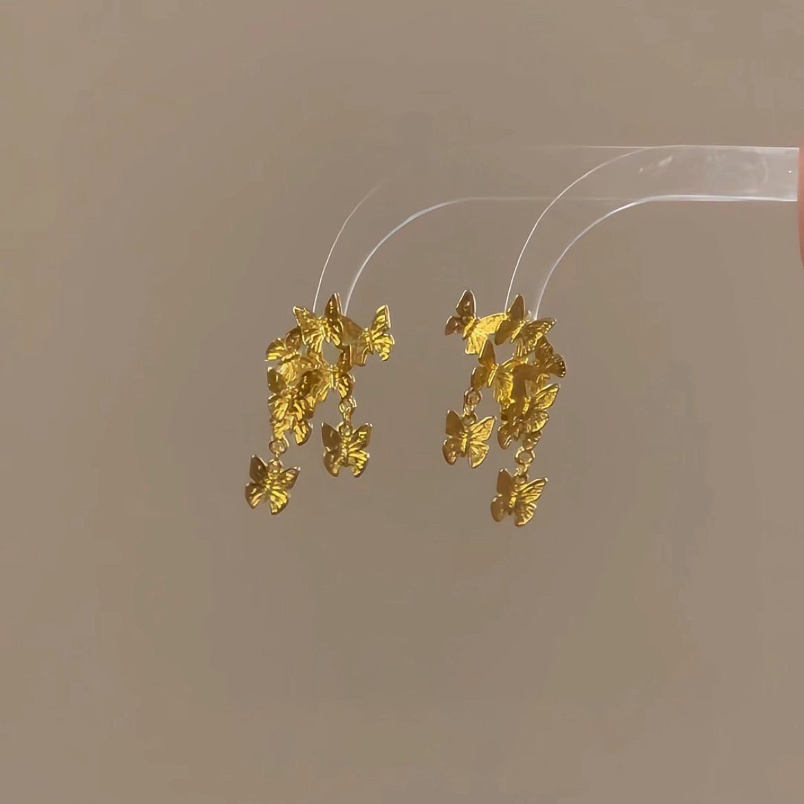 "Group of Butterflies Dancing: Retro Golden Butterfly Earrings 2025 New bestseller, high-end, light luxury, niche and unique earrings for women. Application Scenario