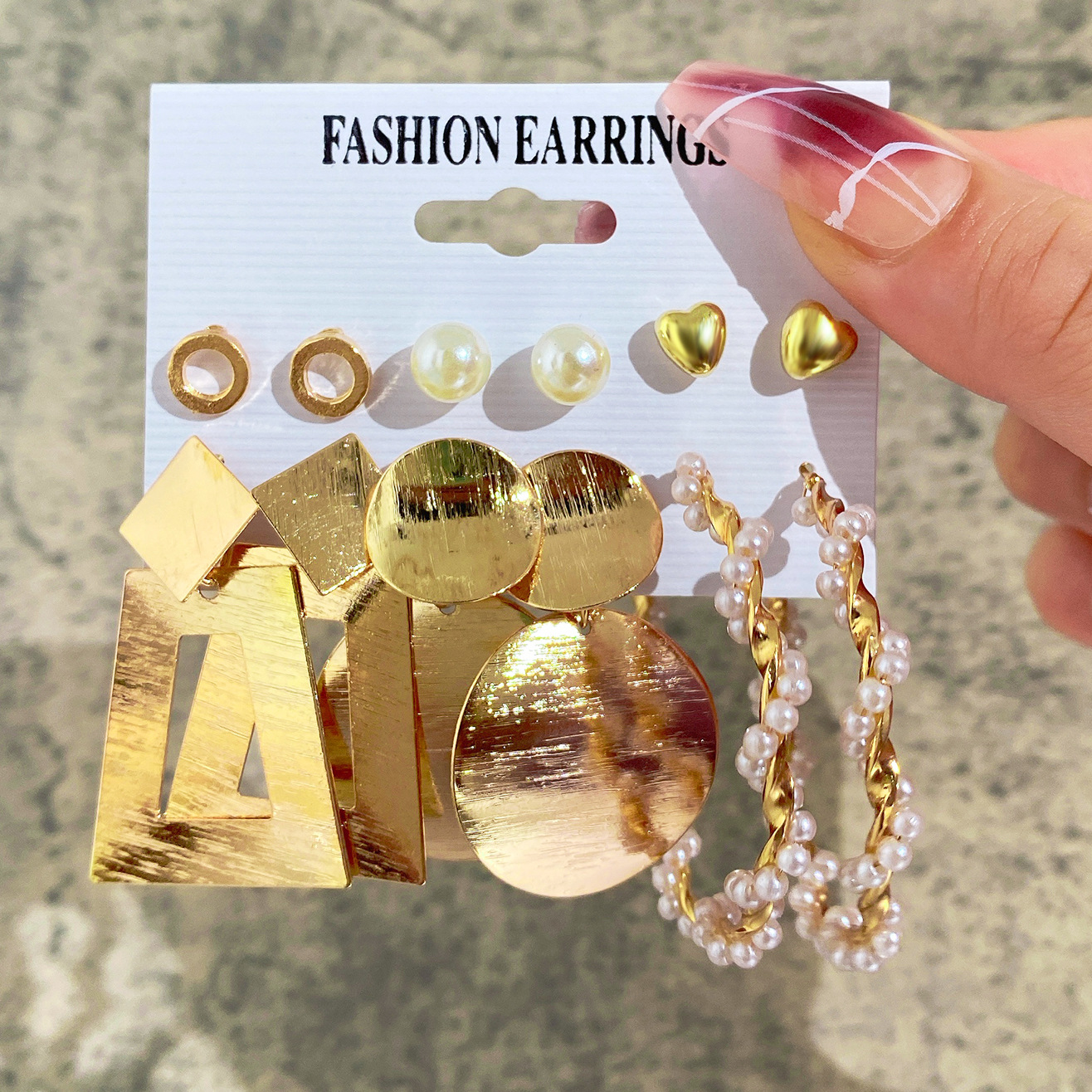 Hot-selling European and American alloy earring sets, silver geometric shape personalized and exaggerated earrings, pearl imitation earrings wholesale details Picture