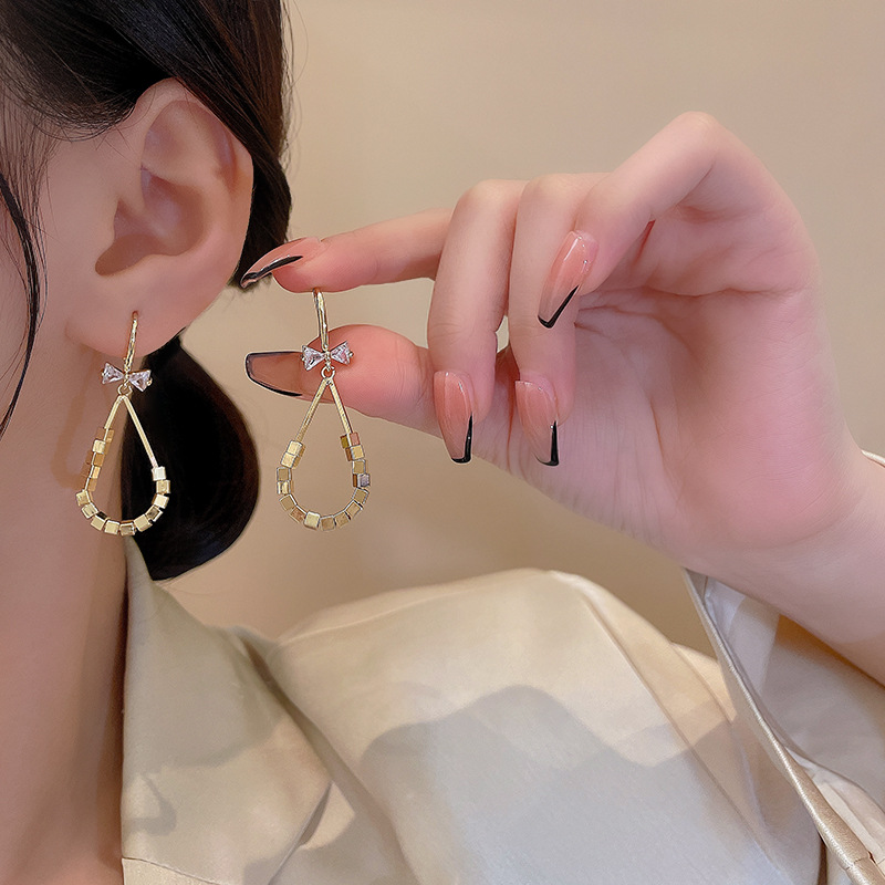 Micro-inlaid zircon bow ear hooks, European and American style, unique square style earrings, 925 silver needle, high-end earrings details Picture