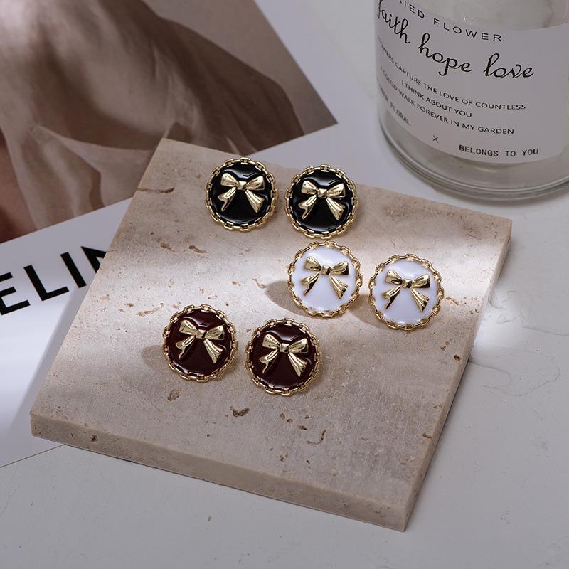 S925 Silver needle Korean cute bow round button stud earrings, forest style retro girl black and white two-color earrings full figure
