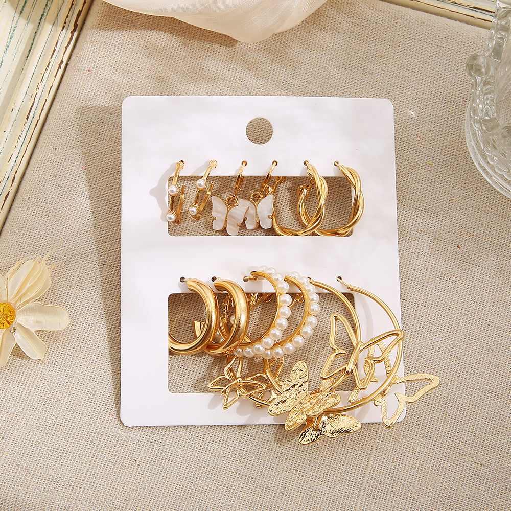 A new set of metal butterfly earrings from Europe and America, set of imitation pearl earrings, and a combination of Ins earrings are high-end and niche Application Scenario
