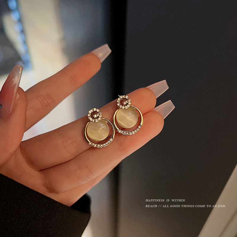 Light luxury and high-end, letter cat's eye stone ear studs, feminine charm, ins style earrings, 2023 new trendy earrings wholesale Application Scenario
