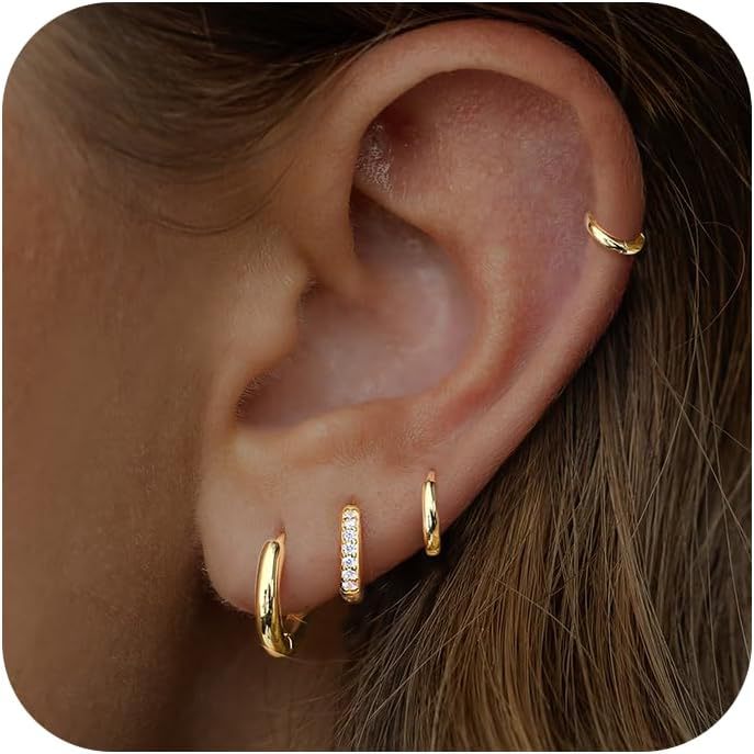 A 4-piece set of cross-border European and American jewelry, fashionable and creative diamond-encrusted copper earrings, with a unique, light luxury and high-end feel. Ear bone clip set full figure