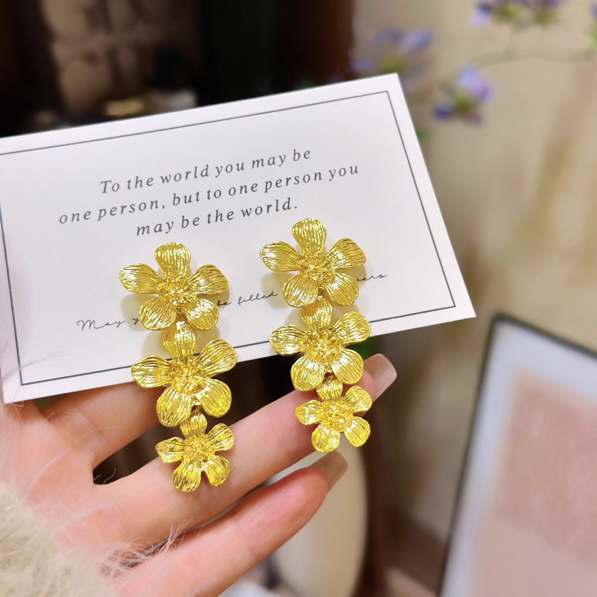Gilded golden flower earrings, women's tassel long metal light luxury high-end earrings, exaggerated and elegant vintage earrings details Picture