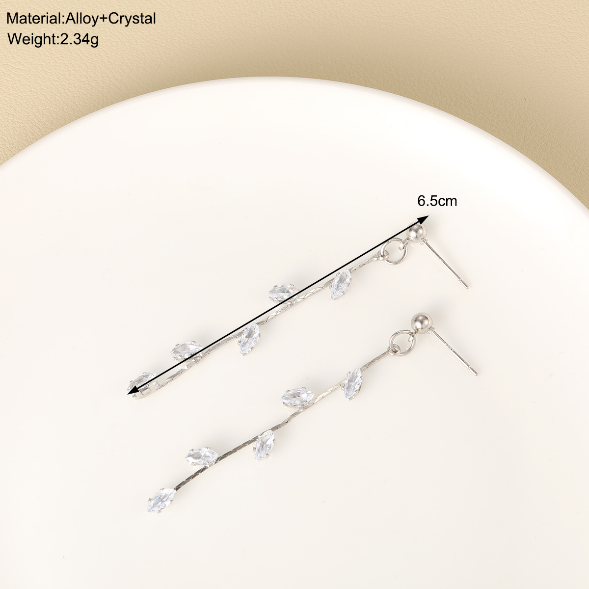 European and American cross-border tassel earrings, with a touch of zircon and a fresh and delicate style, are long and elegant leaf tassel earrings Specification drawing