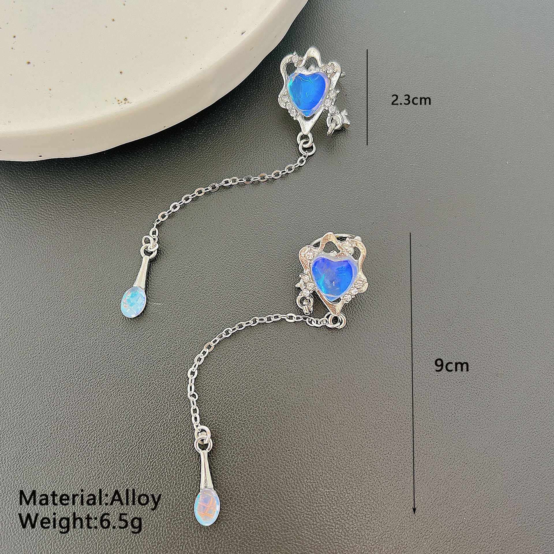 Cross-border niche heart-shaped four-pointed star tassel earrings, cold style light luxury earrings, long tassel imitation pearl women's ear clips Specification drawing