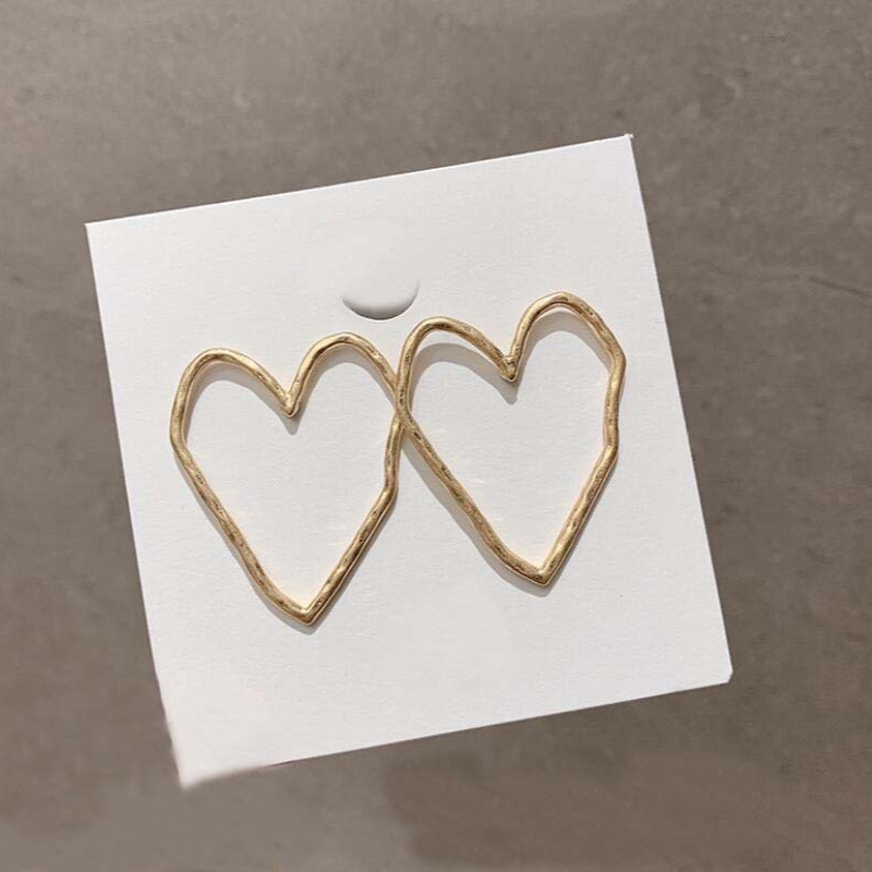 S925 Silver Needle, a new stylish irregular metal heart-shaped large stud earrings from Dongdaemun, South Korea, are versatile and fashionable full figure
