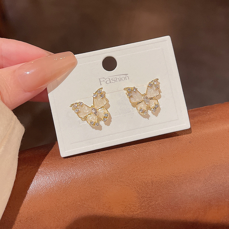 925 Silver Needle Light Luxury Niche cat's Eye Stone earrings, the same style as the trendy female Instagram influencer, super ethereal butterfly stud earrings details Picture