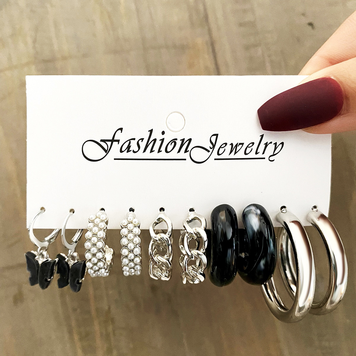 New cross-border black butterfly earrings set, ins simple acrylic C-shaped chain imitation pearl earrings full figure