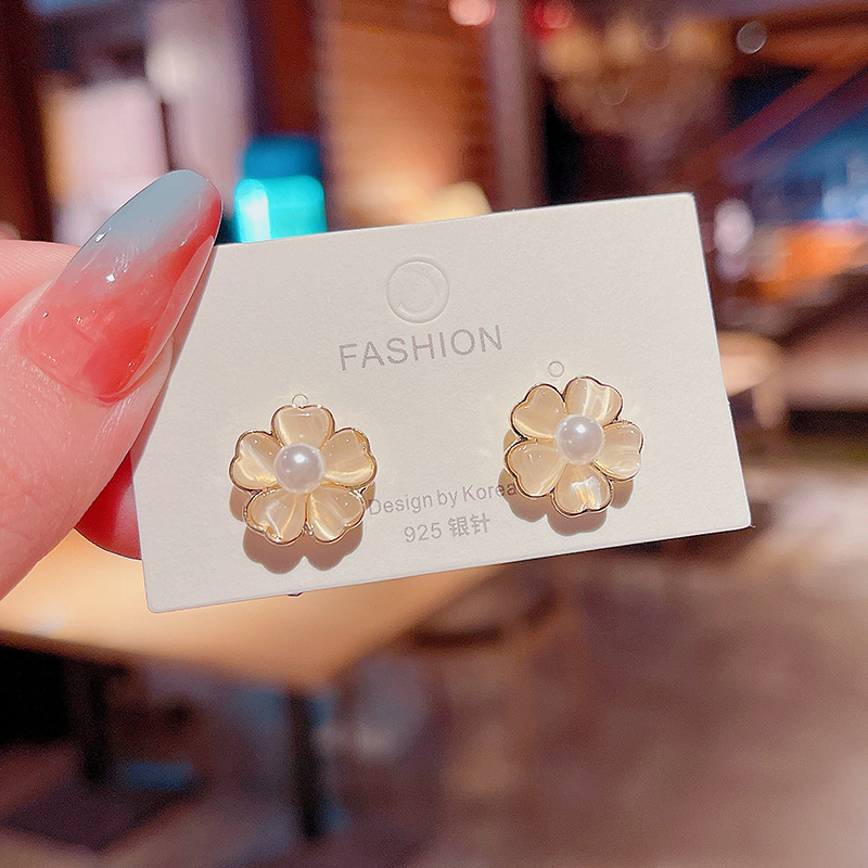 S925 Silver Needle Korean version New Summer cat's eye stone small flower ear studs simple, elegant and fashionable earrings for women full figure